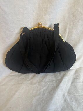 Classic Black Ruched Handbag with Gold Frame